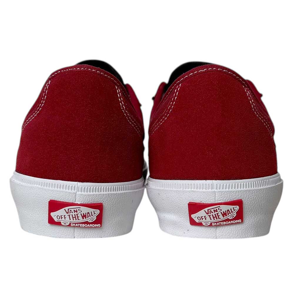 A pair of VN000D85Y521 Skate Curren Caples Red White Vans Skate Suede Rubber Shoes viewed from the back, featuring white midsoles, the Vans Off The Wall logo on the heel, and PopCush insoles for comfort.