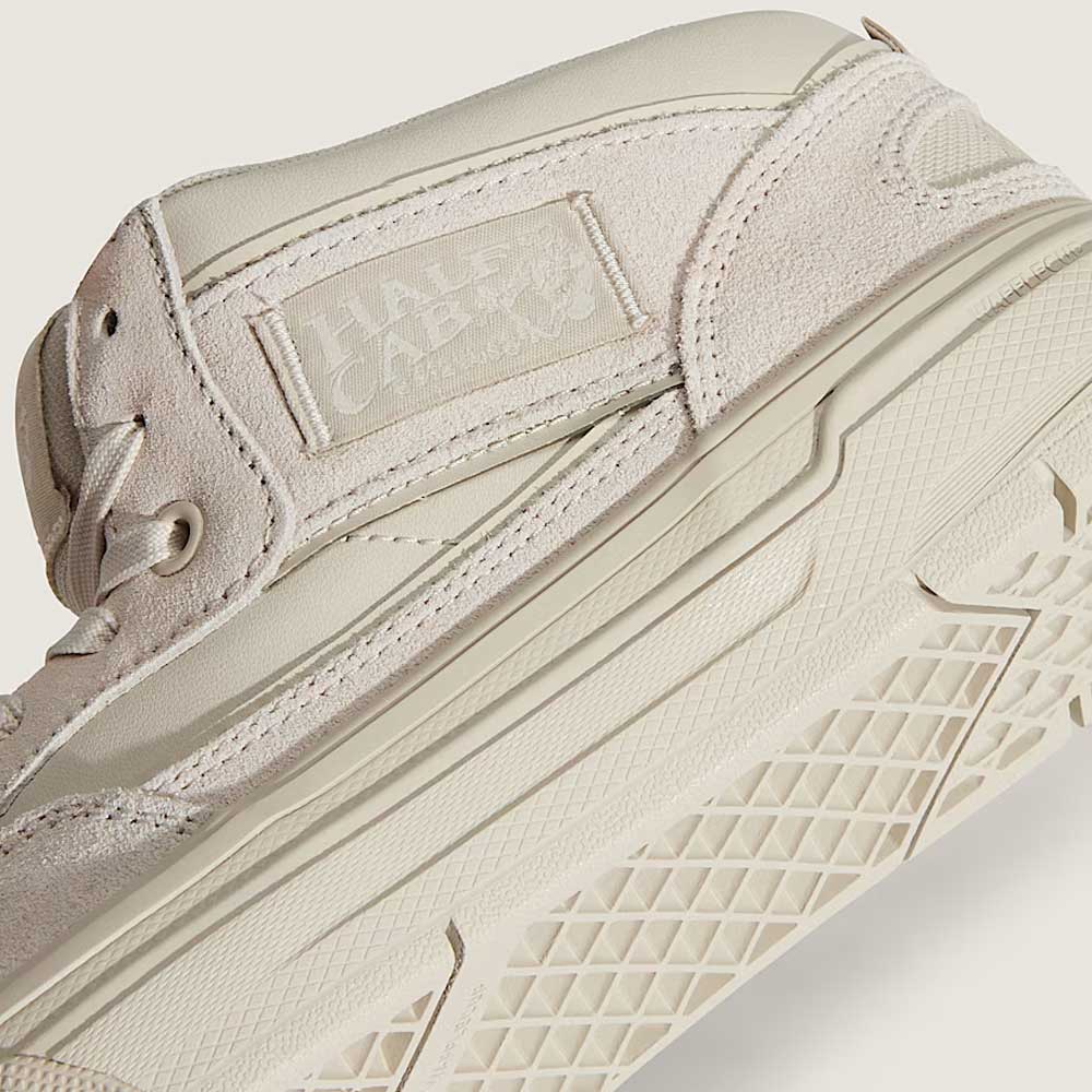 Close-up of VN000D9Z2N1 Atiba Oatmeal Suede Skate Wafflecup Half Cab Vans Shoes, featuring a beige suede and leather upper, textured side panel, detailed rubber outsole with Wafflecup construction, and a minimal monochrome look.