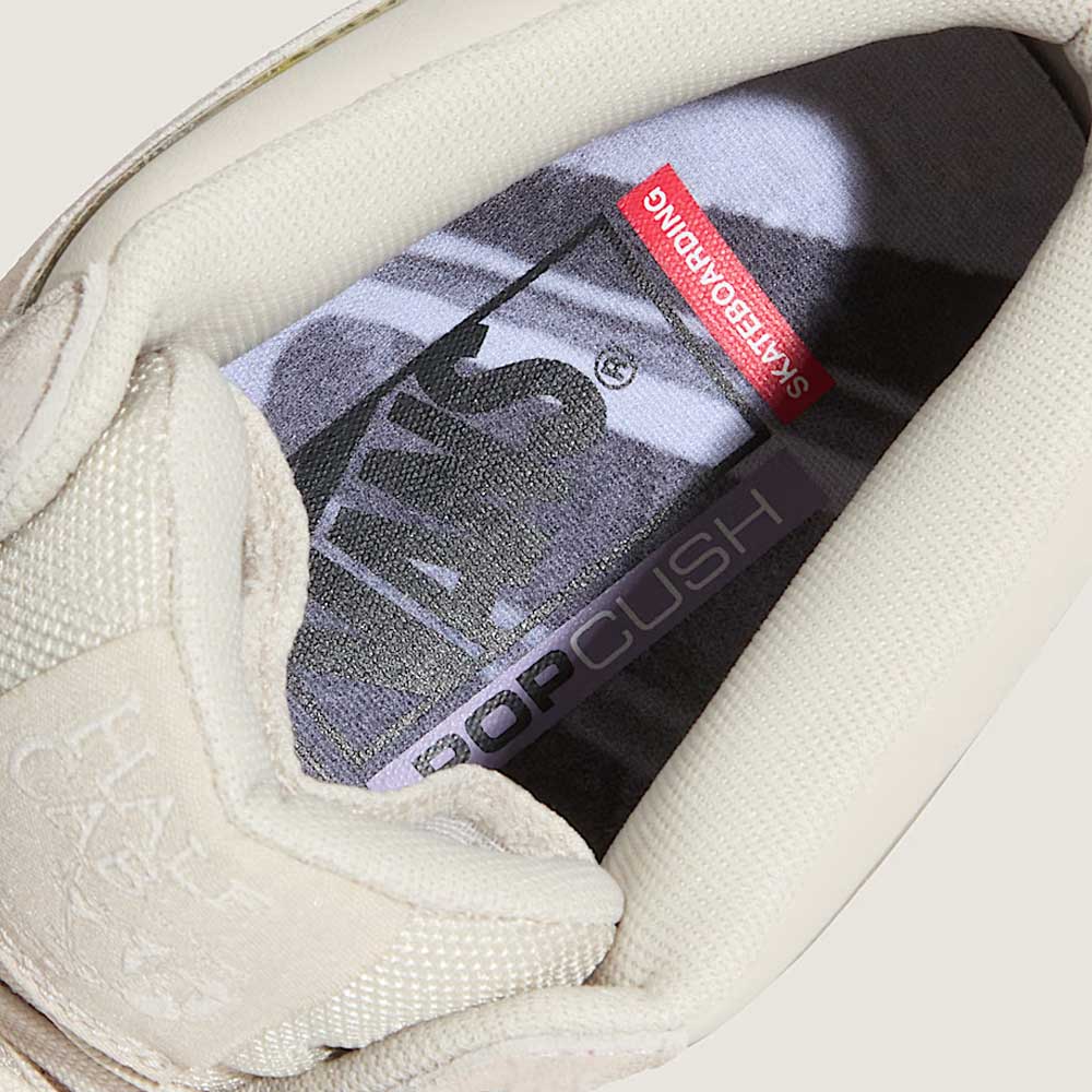 Close-up of the VN000D9Z2N1 Atiba Oatmeal Suede Skate Wafflecup Half Cab Vans shoe, featuring the insole with Vans, POPCUSH, SKATEBOARDING text, and padded collar and tongue for signature comfort and Wafflecup support.