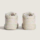 The VN000D9Z2N1 Atiba Oatmeal Suede Skate Wafflecup Half Cab Vans Shoes are off-white, shown from the back with textured details, stitching, and branded heel tabs on Wafflecup soles against a plain background.