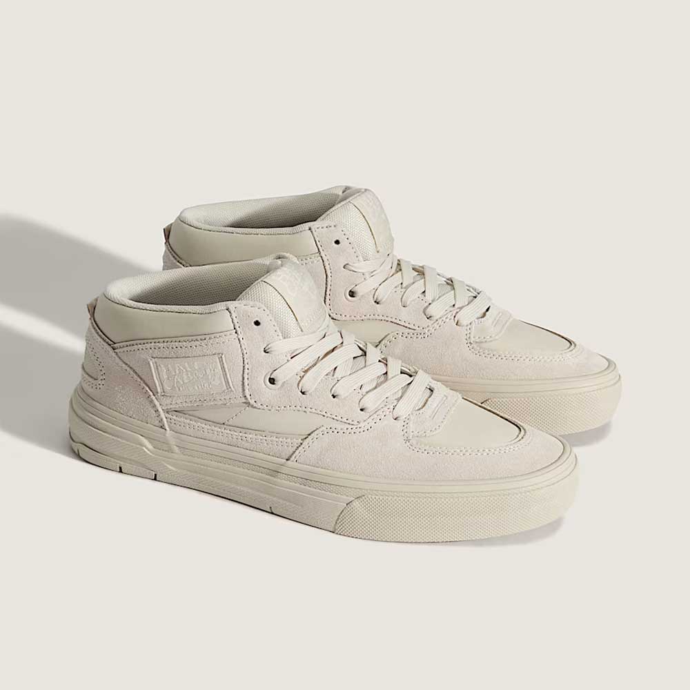 A pair of VN000D9Z2N1 Atiba Oatmeal Suede Skate Wafflecup Half Cab Vans Shoes with laces, textured Wafflecup soles, and subtle stitching details, placed side by side on a light background.