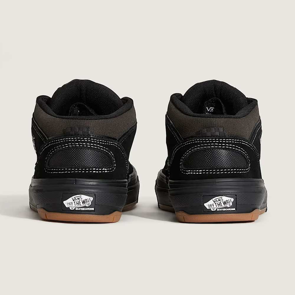 A pair of VN000D9ZKOU Black Asphalt Suede Skate Wafflecup Half Cab Vans shoes, shown from the back with Off The Wall logos on the heels and brown Wafflecup rubber soles, set against a plain light background.