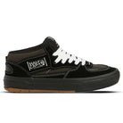The VN000D9ZKOU Black Asphalt Suede Skate Wafflecup Half Cab Vans features white stitching and laces, a black mid-top upper, brown sole accents, a Half Cab side patch, and a durable Wafflecup sole for excellent boardfeel.