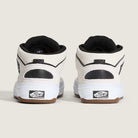 A pair of VN000D9ZYB2 White Black Suede Skate Wafflecup Half Cab Vans shoes shown from the back with black trim, black interior lining, and the Vans Off The Wall logo on the heels. Set against a plain light beige background.