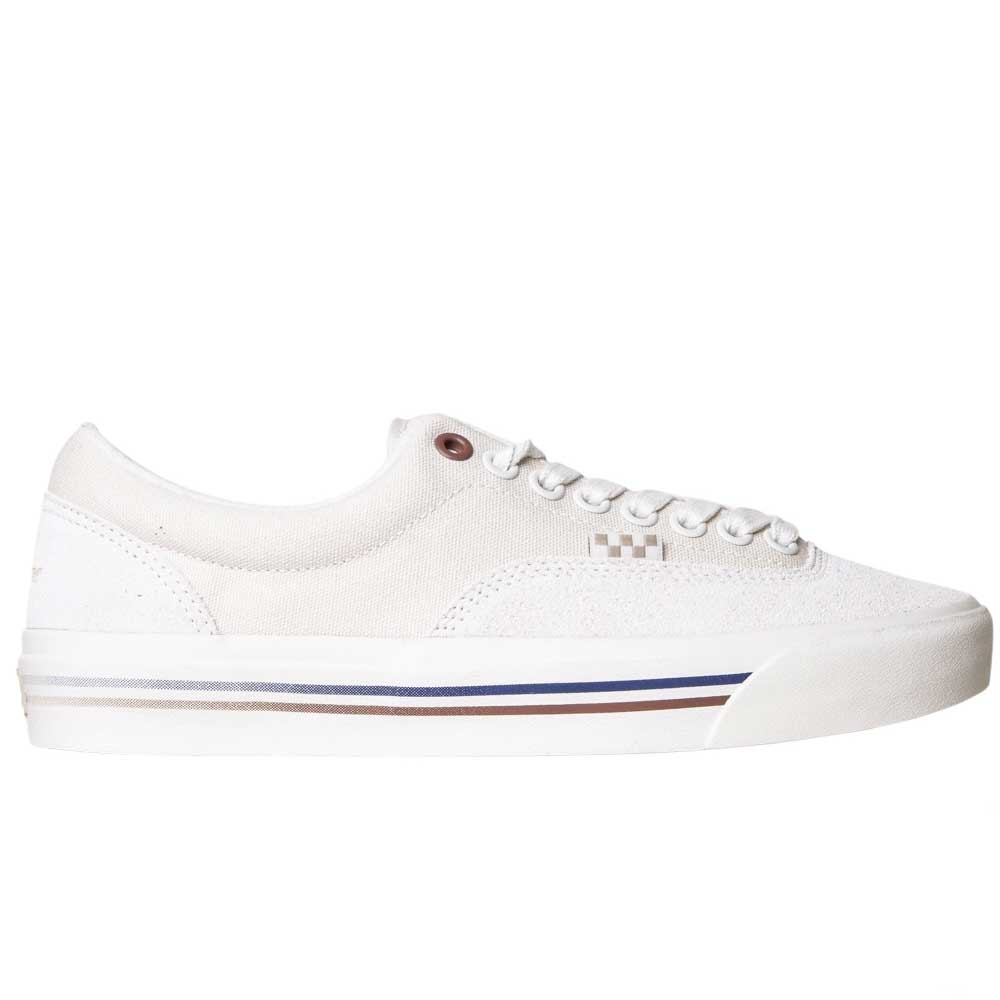 The VN000DA3TUP1 Dime Skate Era Stub Taupe Vans Suede Skateboarding Shoes are low-top sneakers with white laces, a rubber sole, and red and blue stripes on the midsole, offering a clean, classic look ideal for skateboarding.