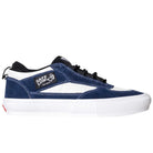 The VN000EEHFRP Skate Safe Low Navy Marshmallow by Vans features a blue and white suede low-top design, black laces, white rubber sole, and a SAFE LOW skull patch, offering durability and impact protection for skateboarding.