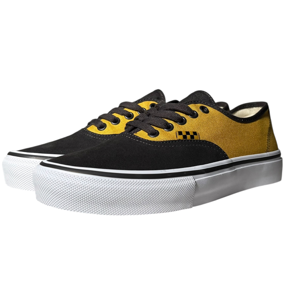The VN000EERBLN Fade Brown Mustard Authentic Vans Skate Suede Shoes are low-top skate shoes featuring yellow canvas sides, black toe caps and laces, white midsoles, and a black-and-yellow checkerboard detail near the eyelets.