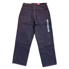 The VN000KXMY7U Skate Check 5 Loose After Dark Denim Vans Pant is a black, heavyweight denim pant with a loose fit, two large back pockets, an iridescent strip near the right pocket, and a red label on the waistband.