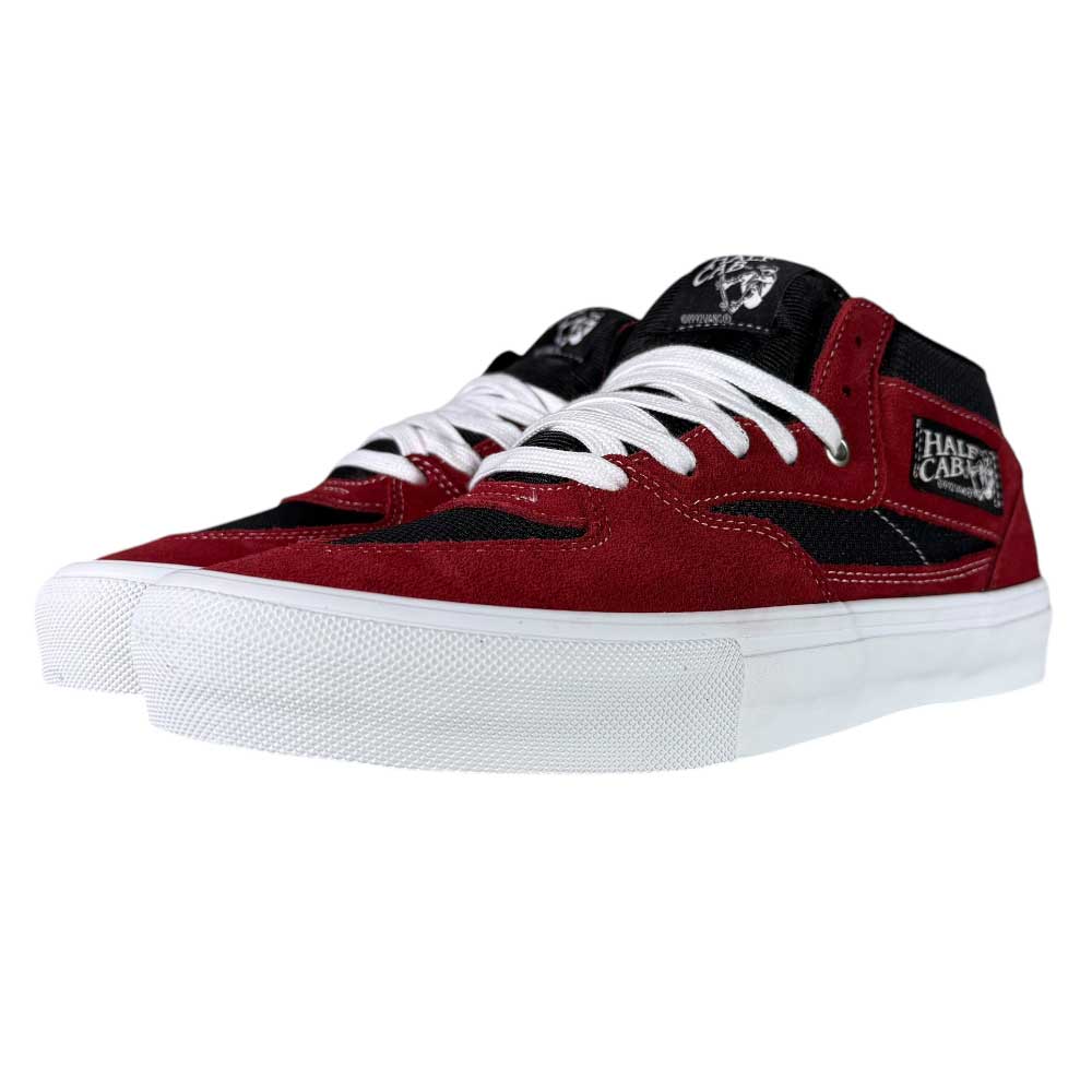 A pair of VN0A2Z34REB Sport Red Black Suede Skate Half Cab Vans Shoes with white laces and rubber soles are displayed side by side on a white background.