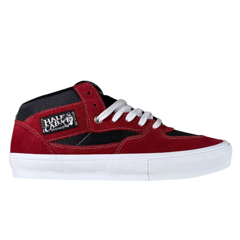 The VN0A2Z34REB Sport Red Black Suede Skate Half Cab Vans Shoes feature a red and black mid-top design with white laces, a white sole, half cab label, and durable suede and canvas materials for style and performance.