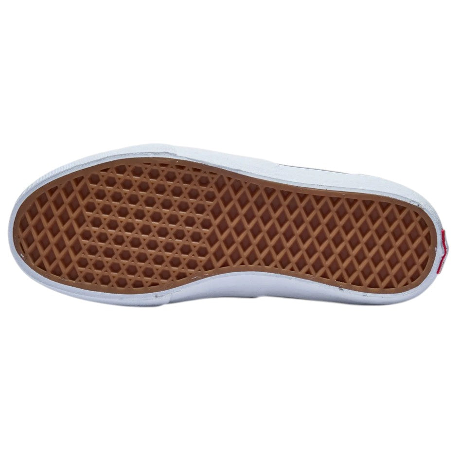 Bottom view of a Vans Rowan True Navy VN0A5JIC5TU Suede Skateboarding Shoe featuring a white rubber midsole and a brown gum rubber waffle-patterned outsole.