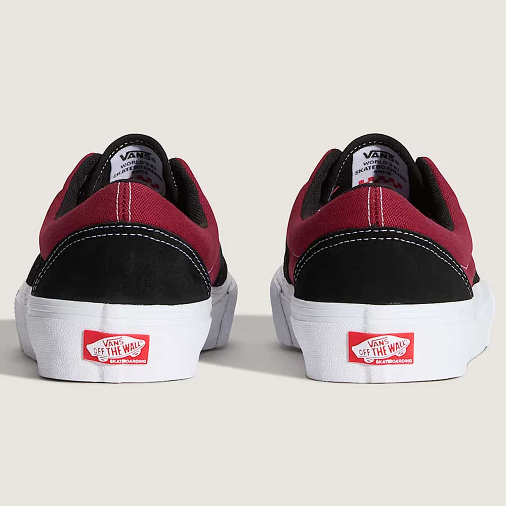 The Vans Skate Era Black Dark Red VN000ECRBDK1 shoes feature red suede uppers, black heels, padded collars, white rubber soles, and the signature red Vans Off The Wall logo on each heel.