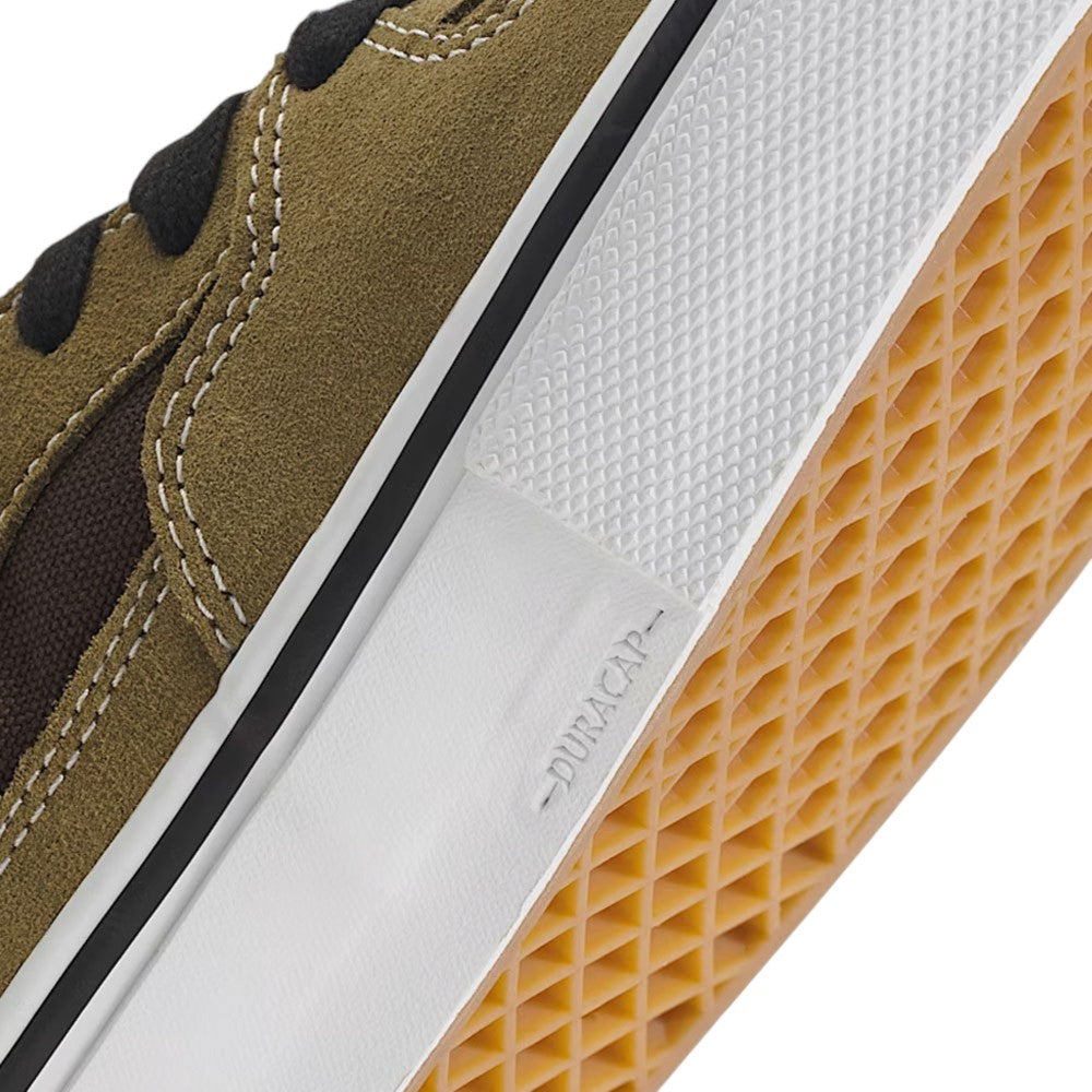 Close-up of an olive brown Vans Skate Half Cab Olive Brown VN0A5FCDOVB Suede Skateboarding Shoe, showing the textured white rubber midsole stamped with DURACAP and a gum-colored waffle tread sole for enhanced durability.