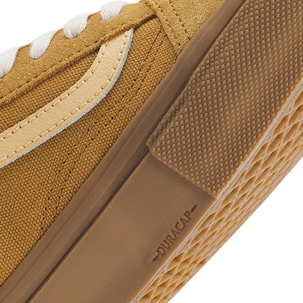 Close-up of a brown Vans Skate Old Skool Autumn Brown VN000EDNGR8 Suede Rubber Skateboarding Shoe, featuring a textured rubber toe cap and a waffle tread sole.