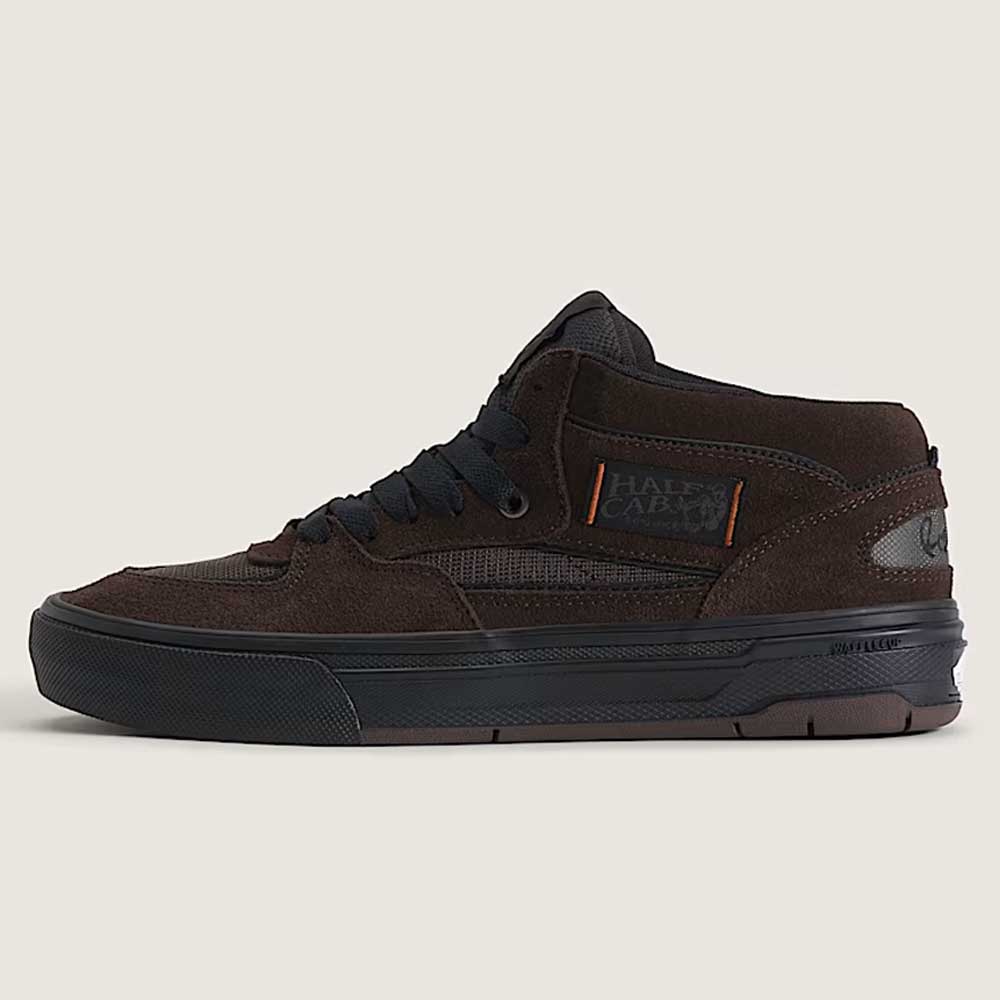 The Vans Wafflecup Half Cab Rizzo Brown Black VN000D9ZY491 Suede Skate Shoes feature a dark brown suede and mesh mid-top design, black laces and sole, HALF CAB ankle patch, orange stitching, and a durable WaffleCup outsole.