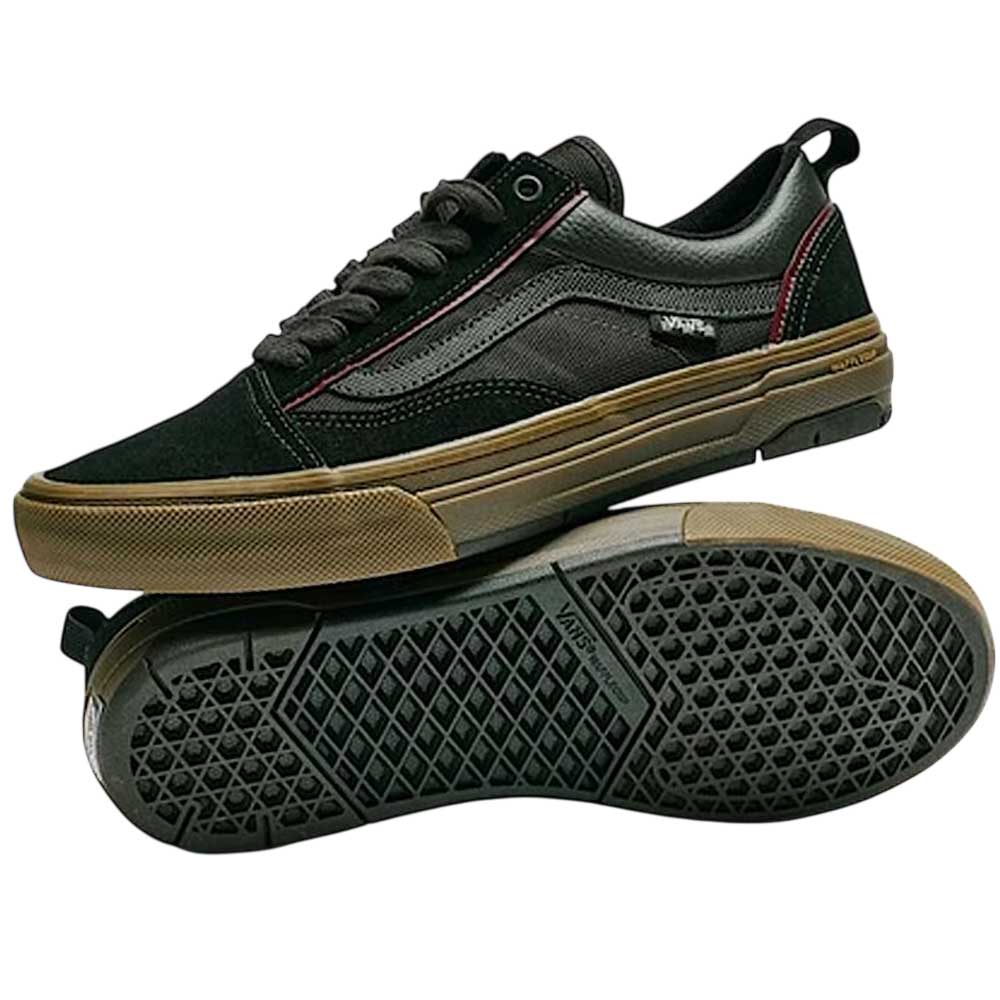 The Vans Wafflecup Old Skool Black Dark Gum VN000EB739L1 Suede Skate Shoes feature black uppers with brown gum soles, black laces, side stitching, suede accents, durable DuraCap reinforcement, and a classic waffle-patterned sole.