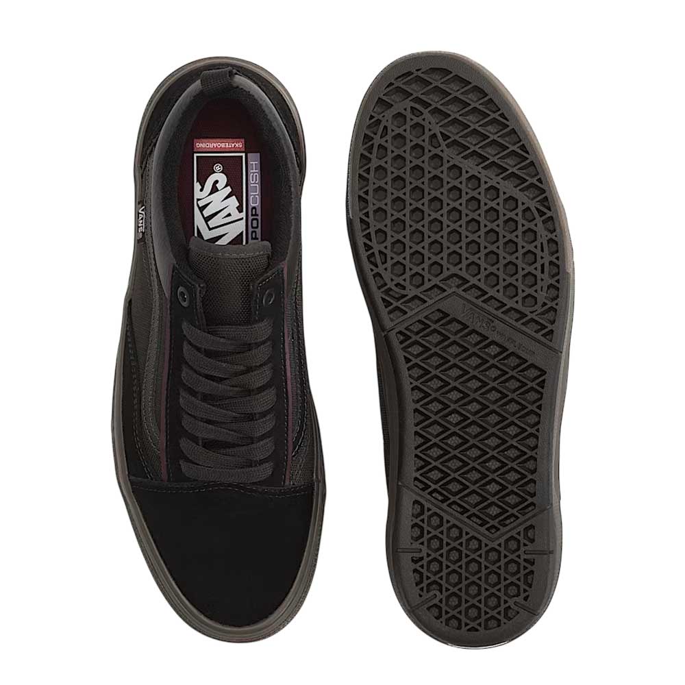 The Vans Wafflecup Old Skool Black Dark Gum VN000EB739L1 Suede Skate Shoes are shown from above and below, highlighting the laced top view, dark gum waffle-patterned sole, and tough DuraCap overlays for lasting wear.