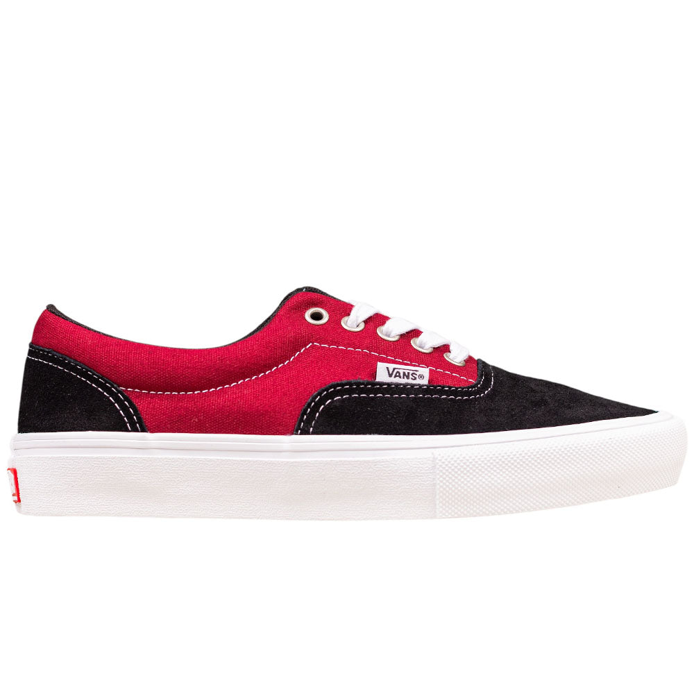 The Vans Skate Era Black Dark Red VN000ECRBDK1 features a red canvas upper, black suede toe and heel, white stitching and laces, a thick white rubber sole, and padded collar for modern performance and comfort.