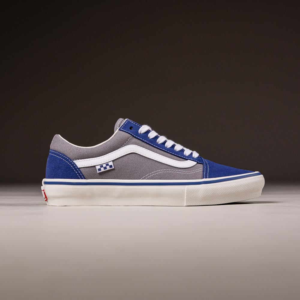 The Vans Skate Old Skool Blue Gray VN000EDNY241 features a blue and gray suede low-top design with white laces, a white side stripe, PopCush footbeds, and a rubber sole, shown against a plain dark background.