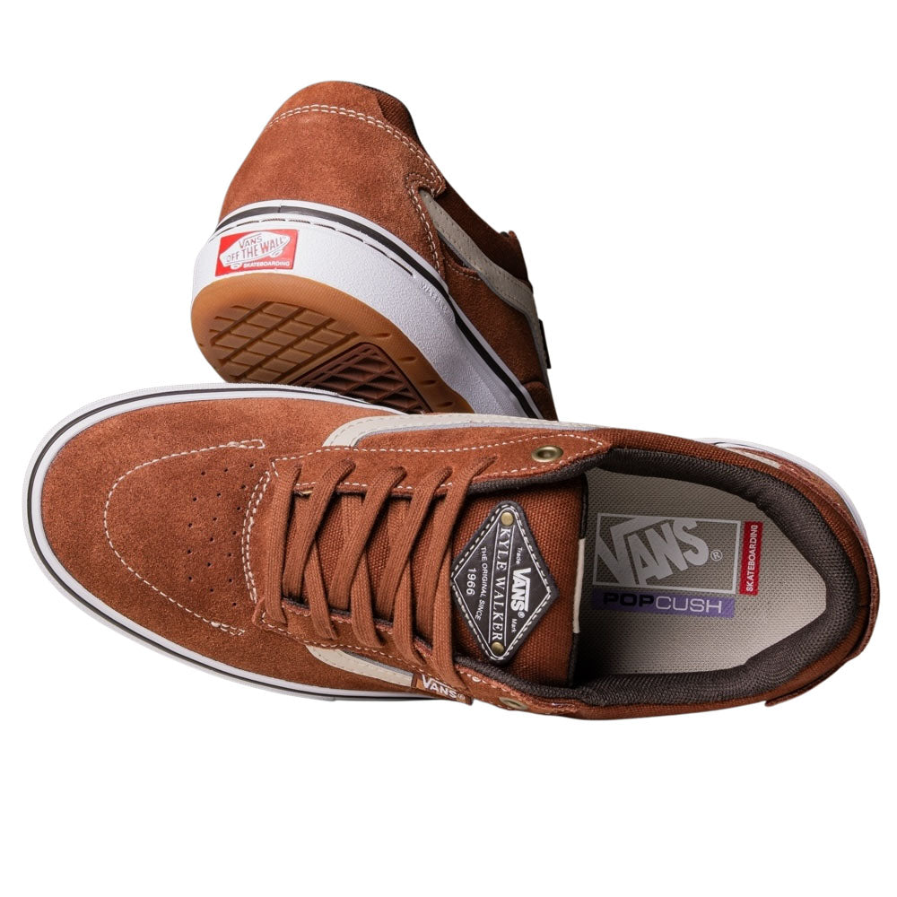 A pair of Vans Skate Kyle Walker Wafflecup Tortoise Shell VN000DA41RE1 suede rubber shoes: brown with white soles, beige side stripes, and PopCush footbeds. One stands upright showing laces; the other lies sideways, displaying the waffle sole and Vans branding.