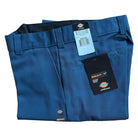 A pair of WPSK67AF Airforce Blue Dickies Skateboarding Pant Regular Fit Twill, size 32x30, folded with tags attached and featuring signature brand logos.