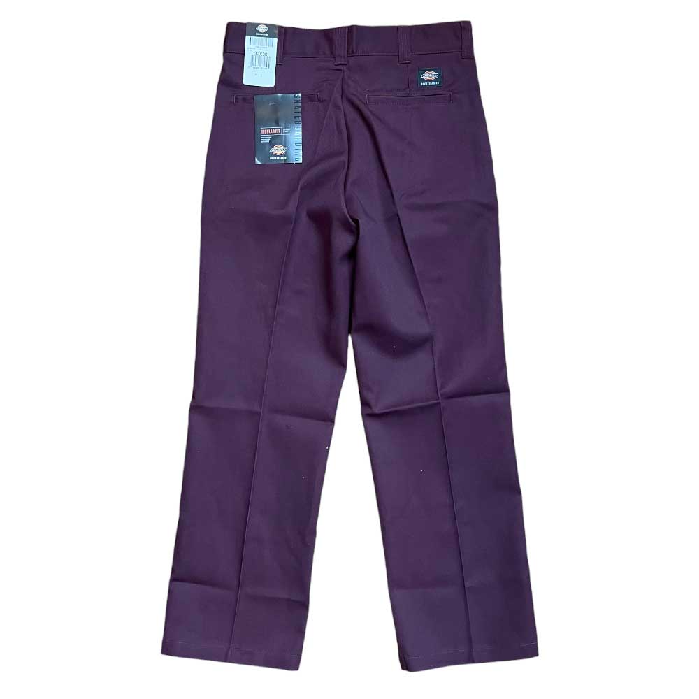 The WPSK67MR Maroon Dickies Skateboarding Pant Regular Fit Twill is shown from the back with tags on the waistband and right pocket, displayed against a white background.