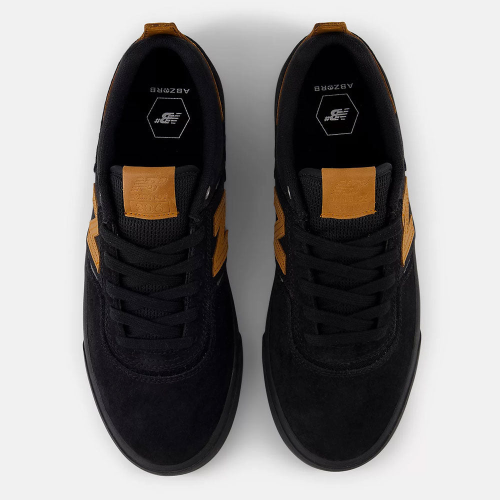 Top view of White Black 306 BON New Balance Numeric suede skateboarding shoes with brown accents, displayed on a white background—Jamie Foy’s pro model vulcanized sneakers.