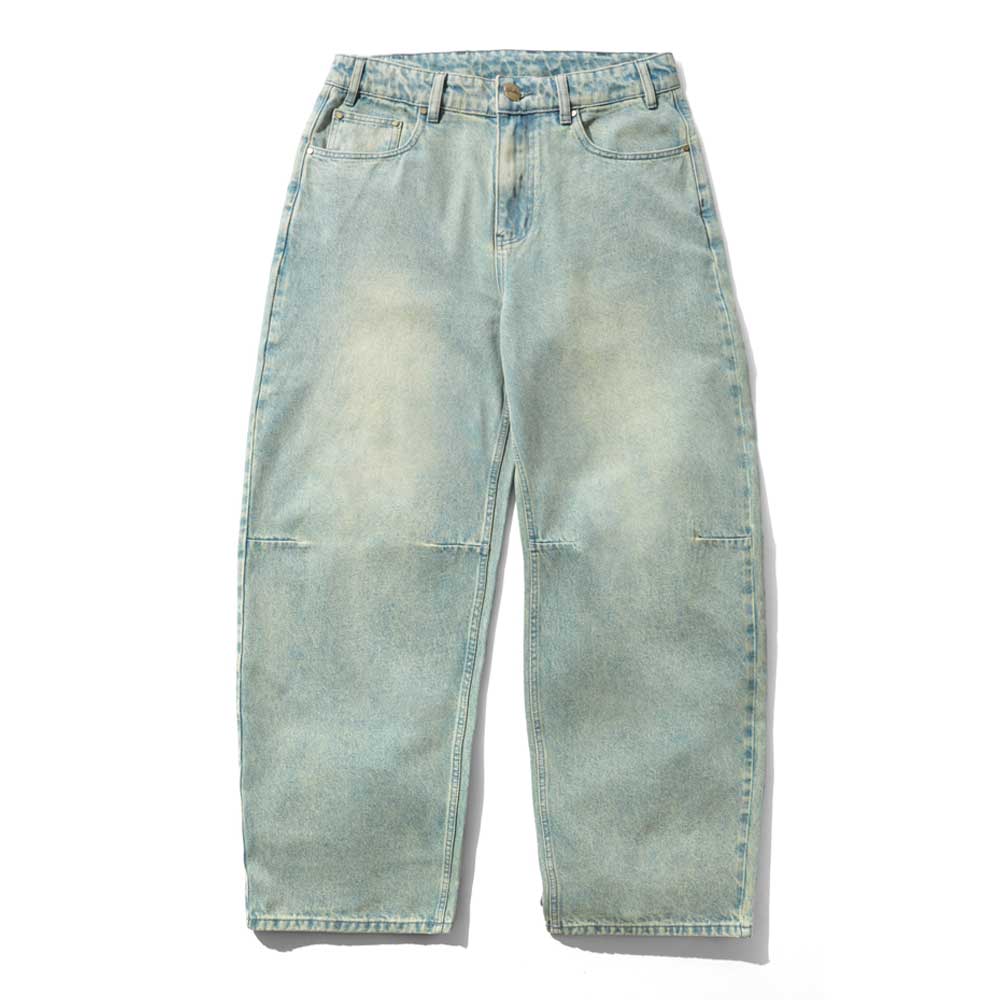Wide Cut Tinted Blue Wash Denim Jeans by Butter Goods—loose fit with front pockets, belt loops, visible knee seams, and a faded blue wash. Shown laid flat on a white background for classic denim style.