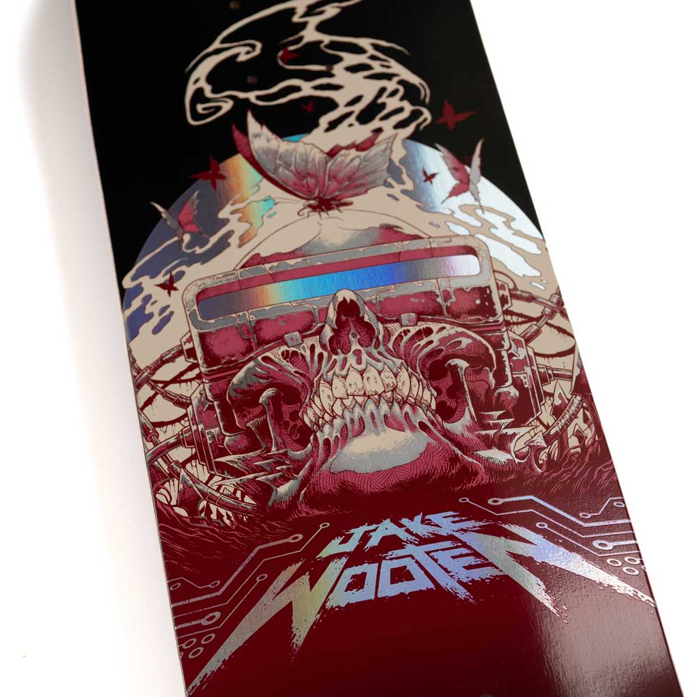The Wooten Cyber VX Deck 8.5in x 32.2in from Santa Cruz Skateboards features a striking graphic of a skull with cassette tape eyes, surrounded by intricate circuit-inspired designs and a prominent bird outline above. Built with durable VX TRI-X technology, this deck also displays the bold “Take Wooter” wording at the bottom.
