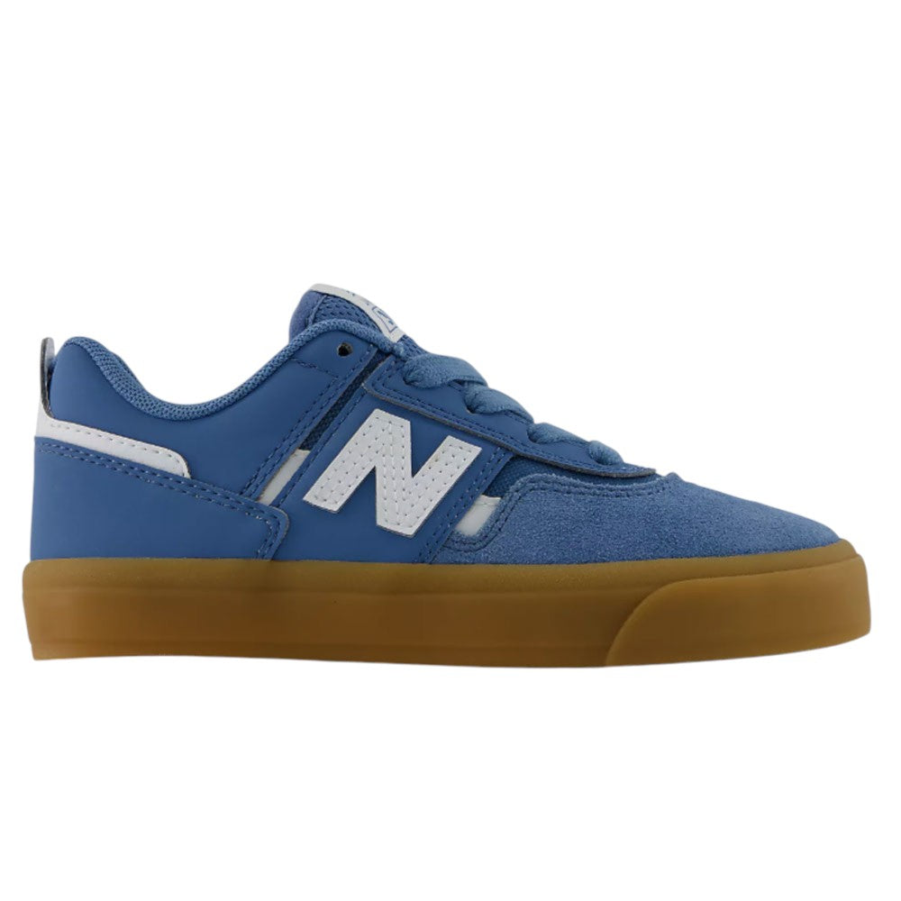 The YOUTH Jamie Foy Cup 306 CAR New Balance Numeric Suede Skateboarding Shoes are shown on a plain white background, featuring a blue suede upper with white accents and a bold white “N” on the side, completed by a durable brown rubber sole—delivering the classic style and tough construction inspired by pro skateboarder Jamie Foy.