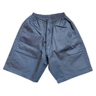 The YOUTH Texas Icon Gray Southside 94 Shorts are loose-fitting, dark gray shorts with an elastic waistband and side pockets—perfect skate shorts for youth, shown laid flat on a white background.