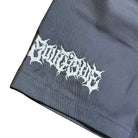 A close-up of dark gray YOUTH Texas Icon Gray Southside 94 Shorts, featuring "Religious" embroidered in white, jagged, gothic-style letters on the lower left corner.