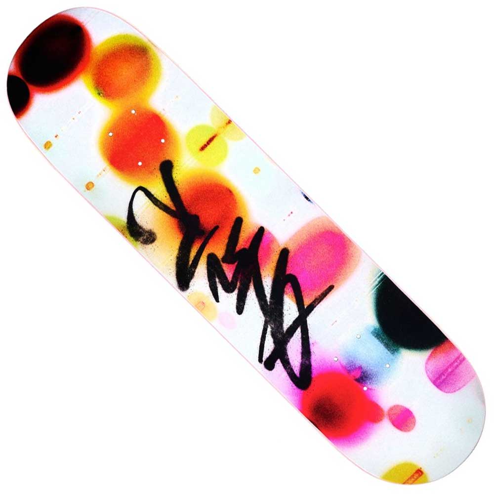 The Yuto Horigome 8.25 Genes April Skateboards Deck features a colorful, abstract design with large, soft-edged circles in various hues and a bold black graffiti-style signature across the center.