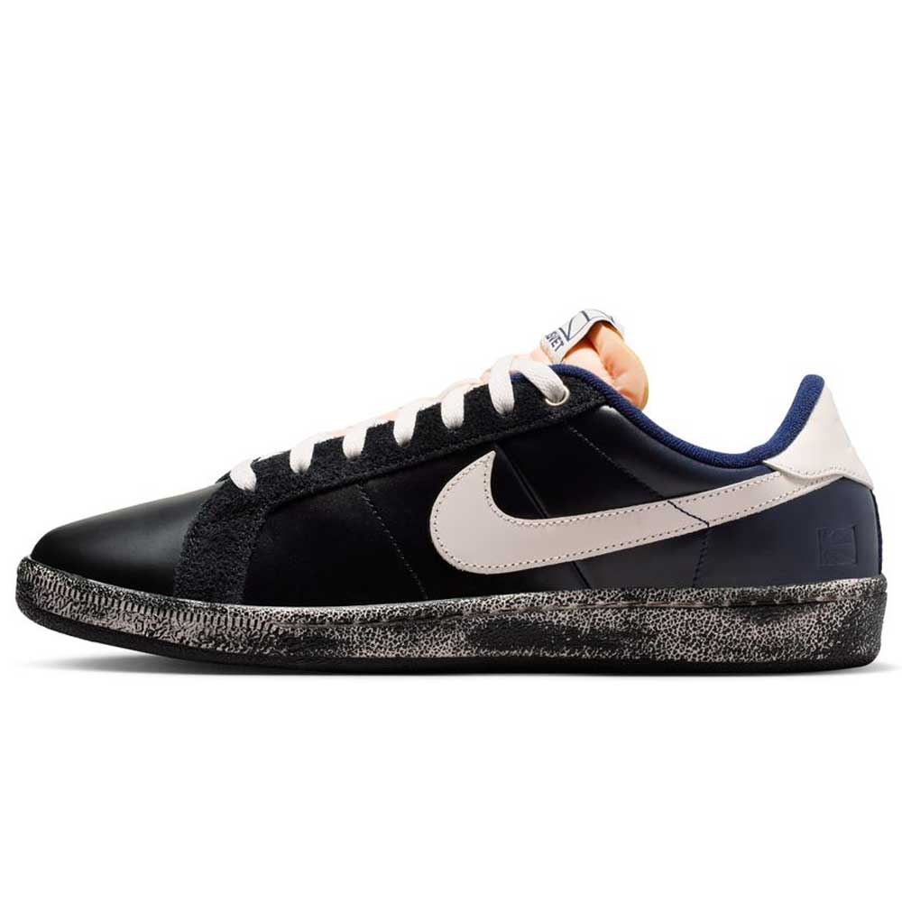 The Zoom Tennis Classic x Rassvet IO9846400 "Blue Void Sail" Nike SB leather skateboarding shoes feature blue and white colors, a prominent swoosh, blue lining, textured sole, and plush cushioning for comfort.
