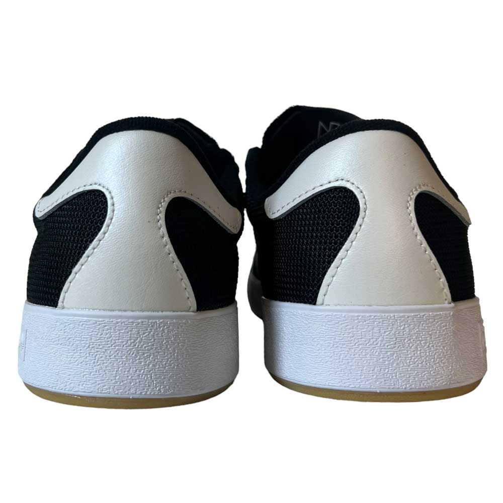 Back view of Adidas Nora Black Zero Spark Suede Knit Shoes with white textured soles and heel accents, shown side by side against a plain background—classic style inspired by vintage skate shoes.