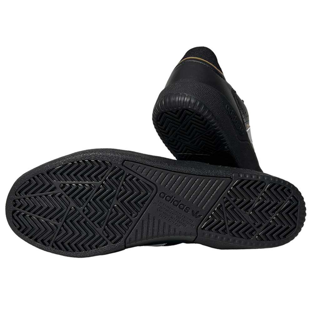 The Tyshawn Low Adidas Skateboarding Black White Leather Suede Shoes feature textured rubber soles with a geometric pattern and the Adidas logo—perfect skate shoes offering style and performance.