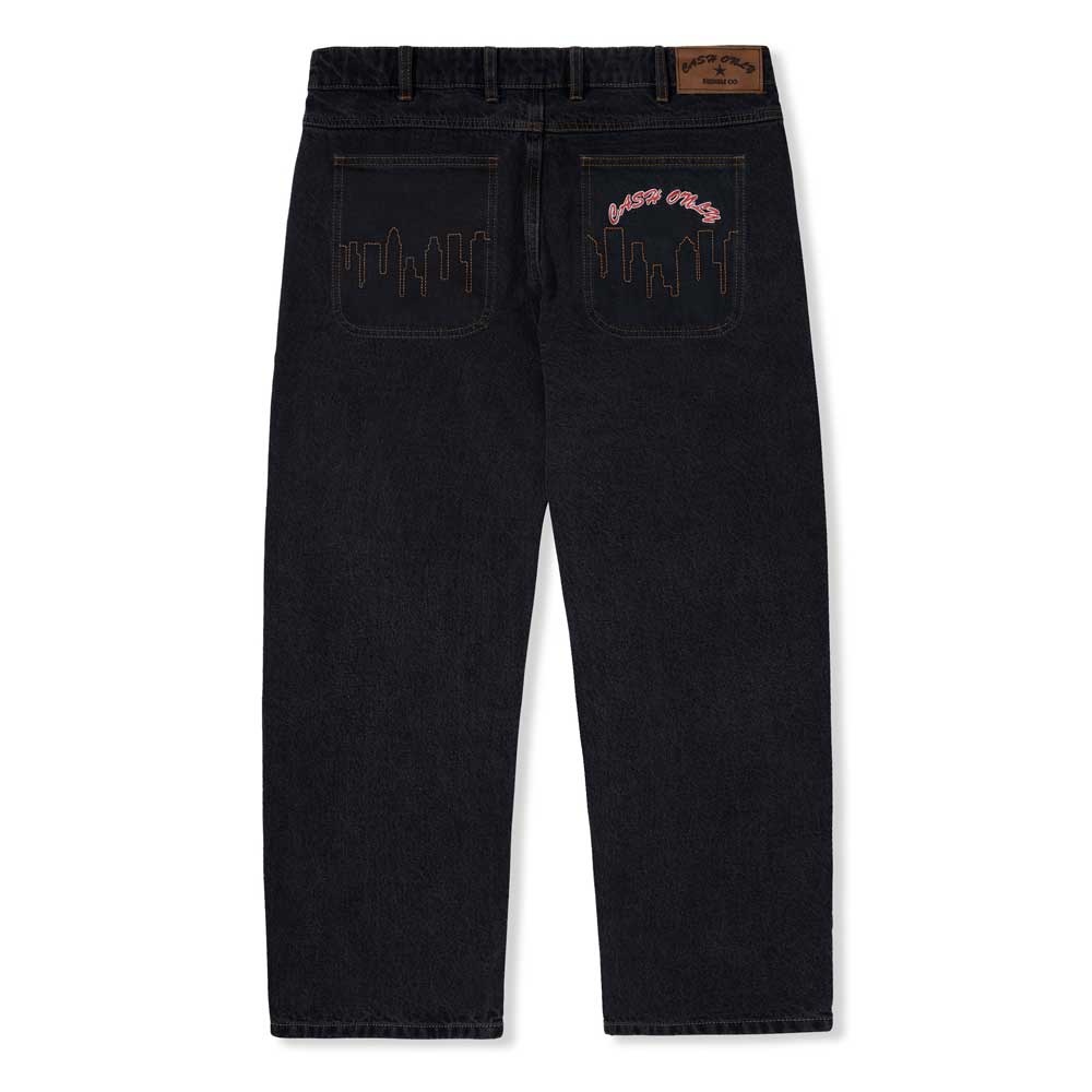 The Logo Baggy Denim Jeans Washed Black Cash Only are displayed flat, back side up, with orange and pink embroidery—city skyline on one back pocket, "New York" on the other—and feature a brown leather patch on the waistband.