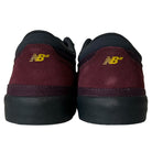 Back view of the New Balance Numeric 417 WBP Franky Villani Eggplant Black Suede Skateboarding Shoes, showcasing yellow NB heel logos, designed in collaboration with Franky Villani.