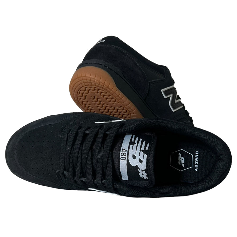 480 SBW New Balance Numeric Shoes in suede black with white logo and gum sole, shown from above and side on a plain white background.