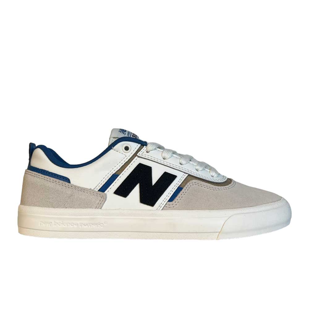 The 306 TWC Jamie Foy New Balance Numeric Suede Shoes feature a white and light gray suede upper with blue interior and accents, a bold black N logo, and a sporty design inspired by pro skater Jamie Foy.