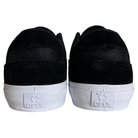 The Standard Low Opus Footwear Black White Suede Shoes feature a blend of suede and mesh uppers, white soles with "OPUS" and a circular logo on the heel, combining style and texture for a standout look.