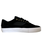 The Standard Low Opus Footwear Black White Suede Shoes feature a white rubber sole, black laces, gold eyelets, and side mesh accents, shown in a photo on a plain white background.