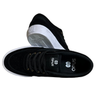 The Standard Low Opus Footwear Black White Suede Shoes feature white soles; one shoe lies on its side showing the sole, while the other stands upright displaying the top, tongue, and signature Opus logo.