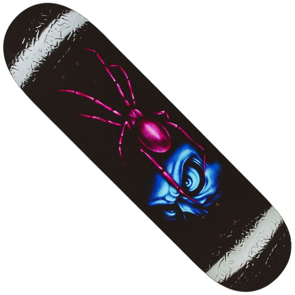 The Spider Louie Lopez Twin Tail 8.38x31.87 FA Deck displays bold magenta spider artwork crawling over a blue, stylized face on a black background with silver, textured edges.