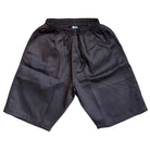 The Texas Icon Brown Southside 94 Shorts are knee-length with an elastic waistband and drawstring, laid flat on a white background—designed for comfort and style, perfect for vert ramp skateboarding sessions.