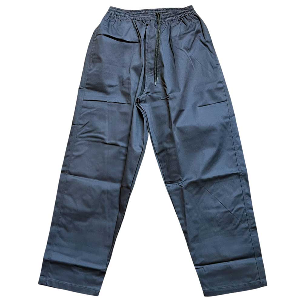 The Texas Icon Gray Southside 94 Pants are loose-fitting, rugged gray pants featuring an elastic waistband with drawstring, visible seams, and lightweight fabric, shown laid flat on a white background.