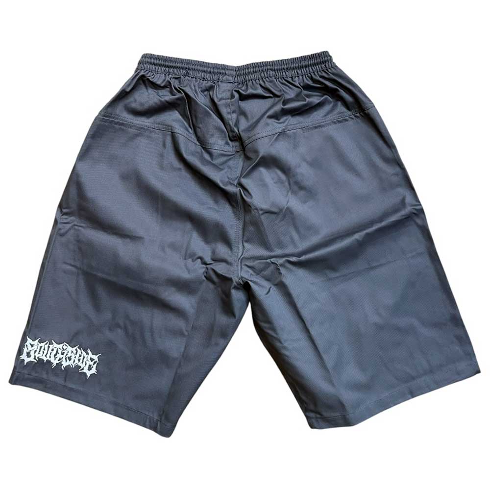Loose-fitting Texas Icon Gray Southside 94 Shorts with an elastic waistband and a white jagged-font graphic logo on the lower left leg, laid flat on a white background.
