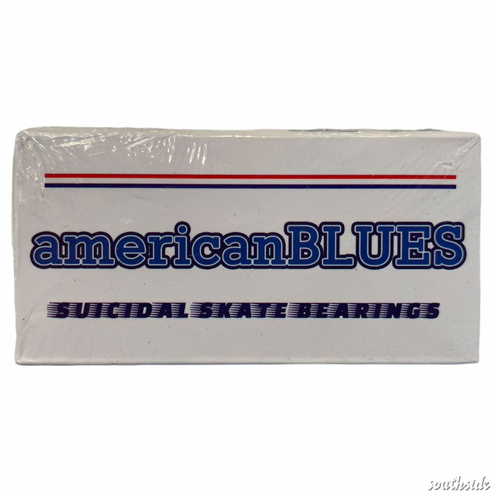 A white rectangular box labeled American Blues Bearings ABEC 9 in bold blue, topped with red and blue stripes and "SUICIDAL SKATE BEARINGS" below, contains premium ABEC 9 titanium coated skateboarding bearings.