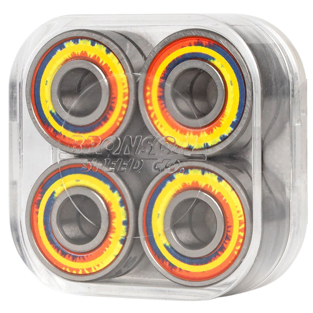 A clear plastic case holds four Bronson Speed Co. Bearings Aaron Jaws Homoki Pro G3 with yellow, orange, and red seals, arranged in a 2x2 grid.