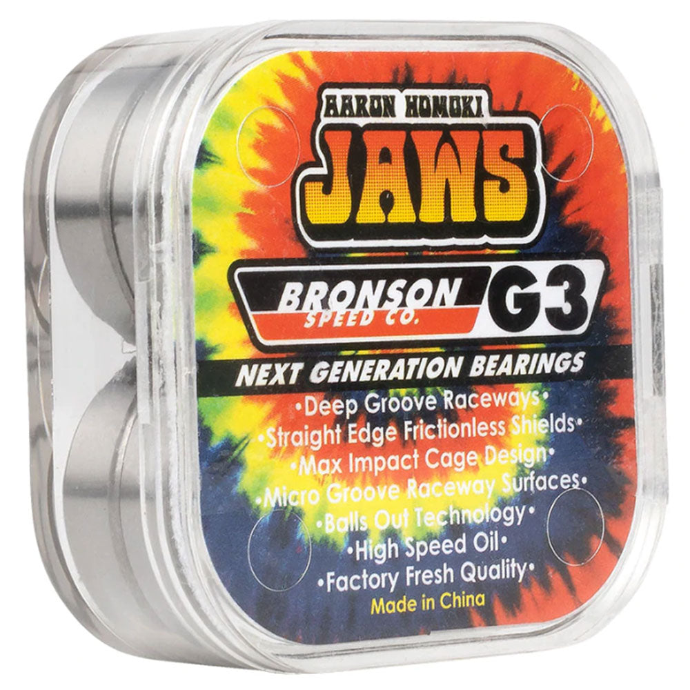 A plastic case with Bronson Speed Co. Bearings Aaron Jaws Homoki Pro G3 features a tie-dye label listing deep groove raceways, high speed oil, and frictionless shields.